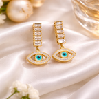 Elegant gold drop earrings with eye charms