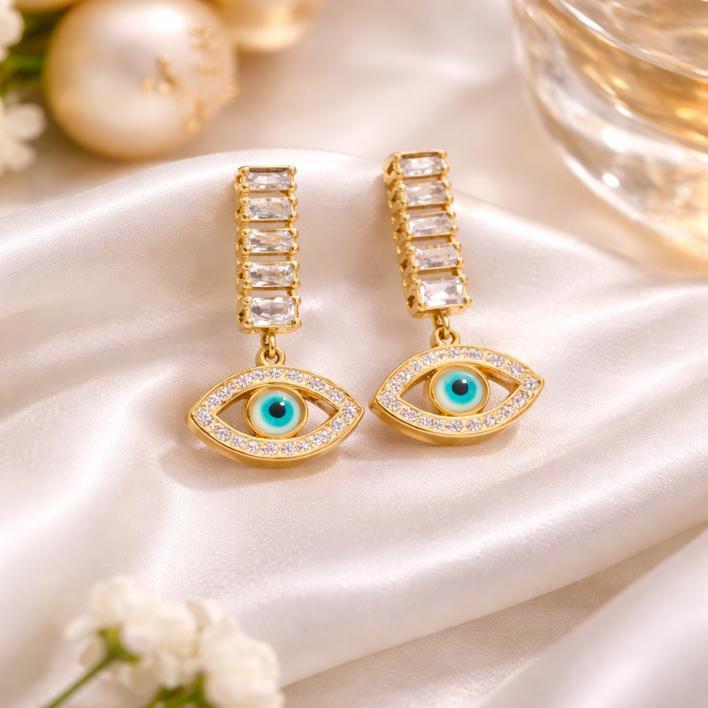 Elegant gold drop earrings with eye charms